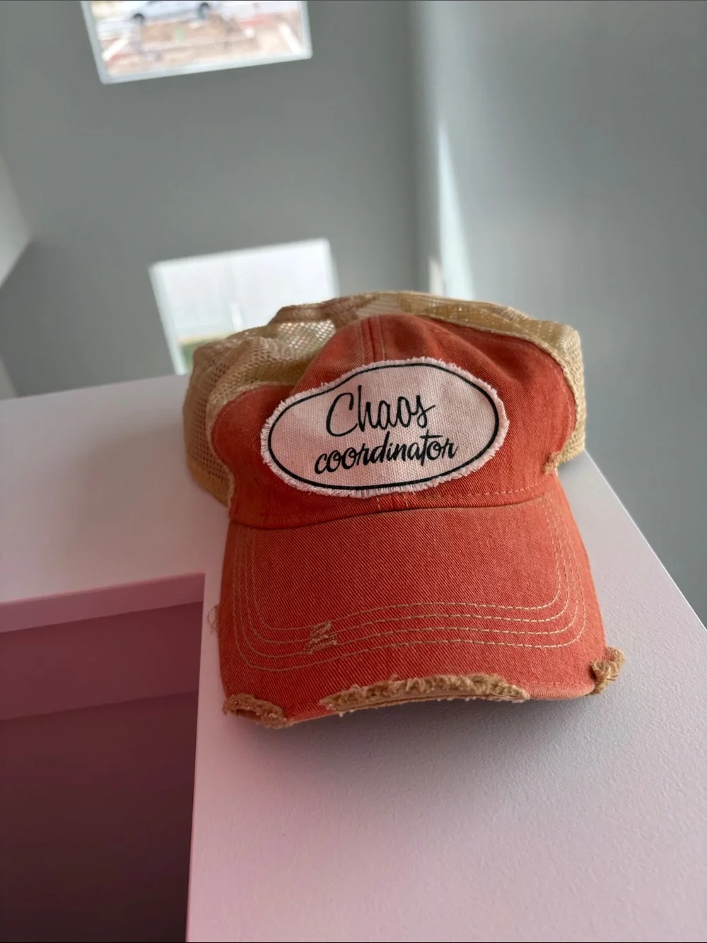 Chaos Coordinator Orange Mesh Trucker Hat